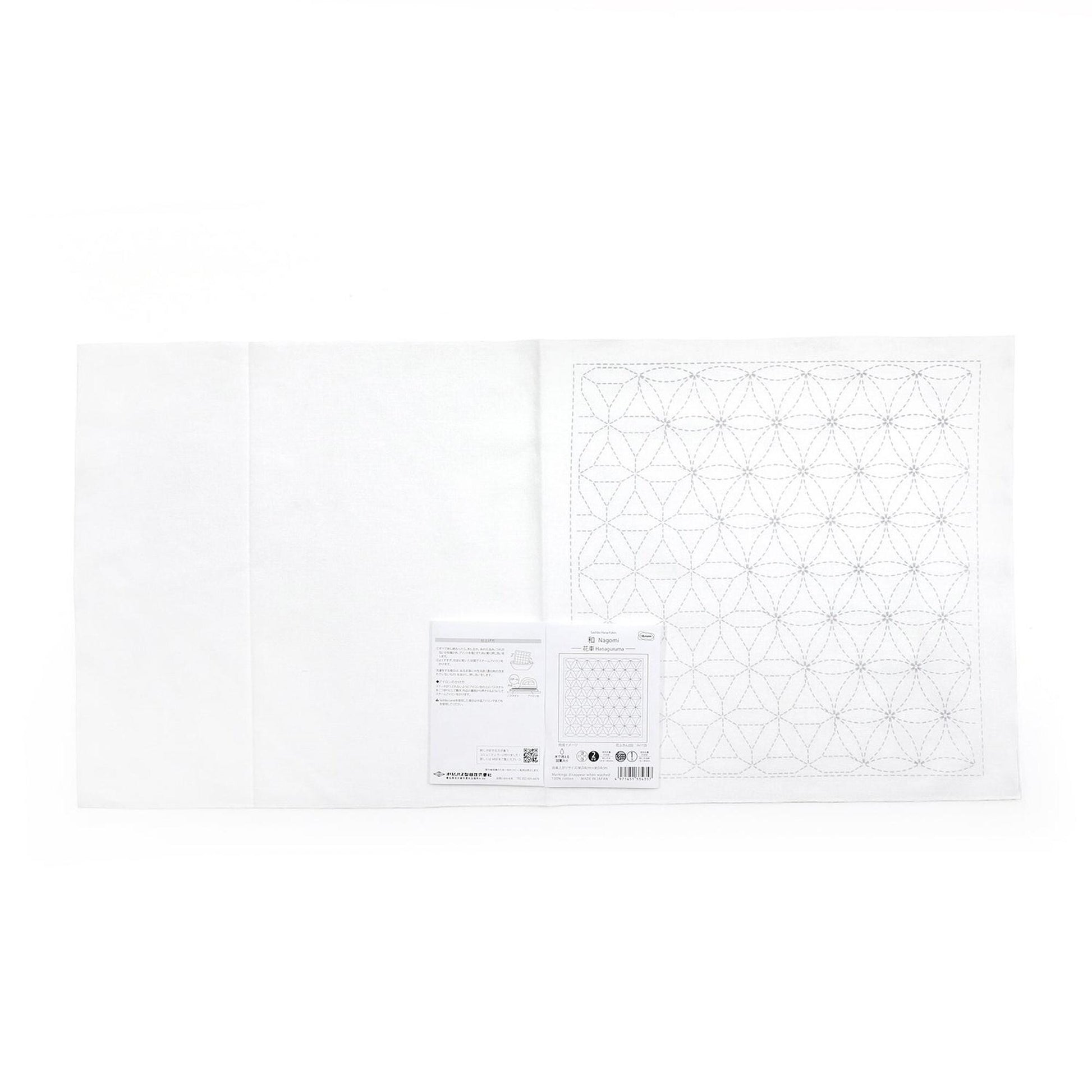 The image is a white sheet of paper with a geometric pattern on it.