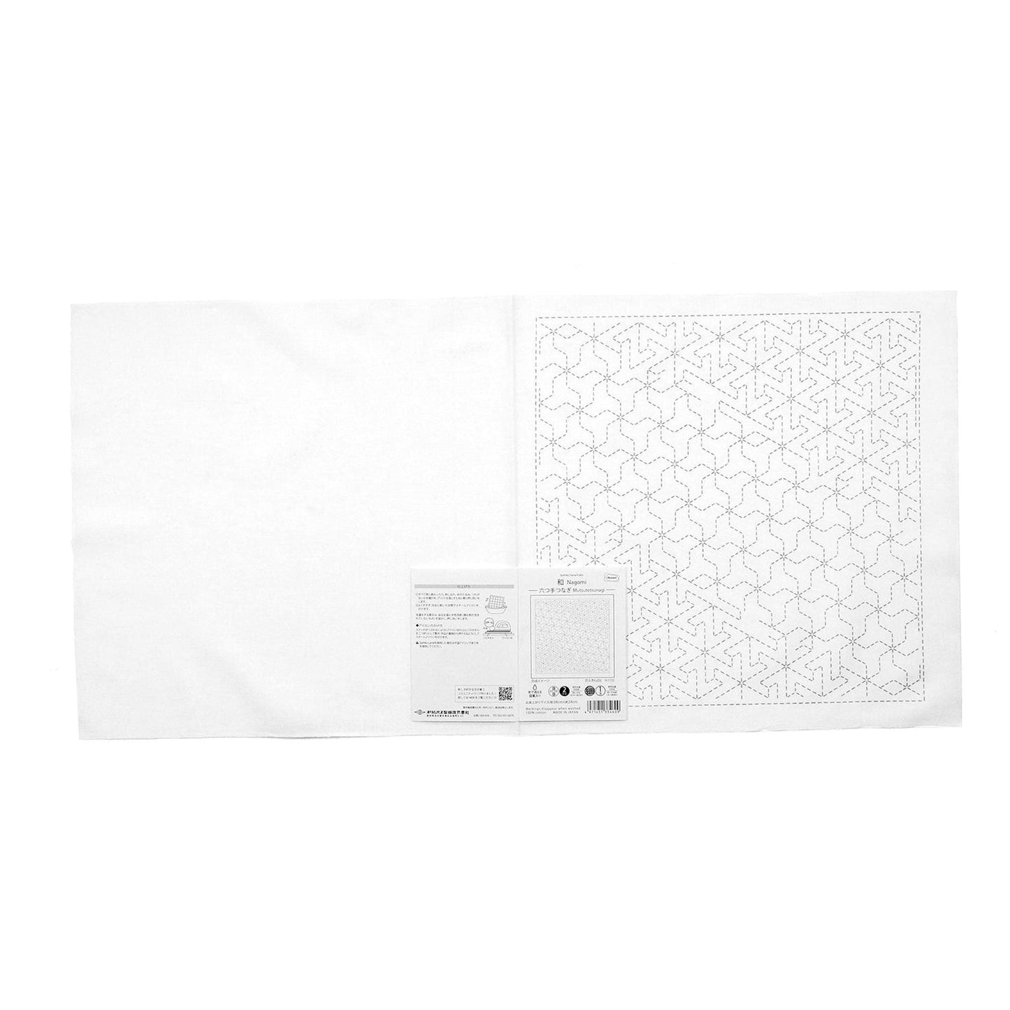 The image is a white piece of paper with a grid pattern of small black dots, resembling a cross-stitch design.