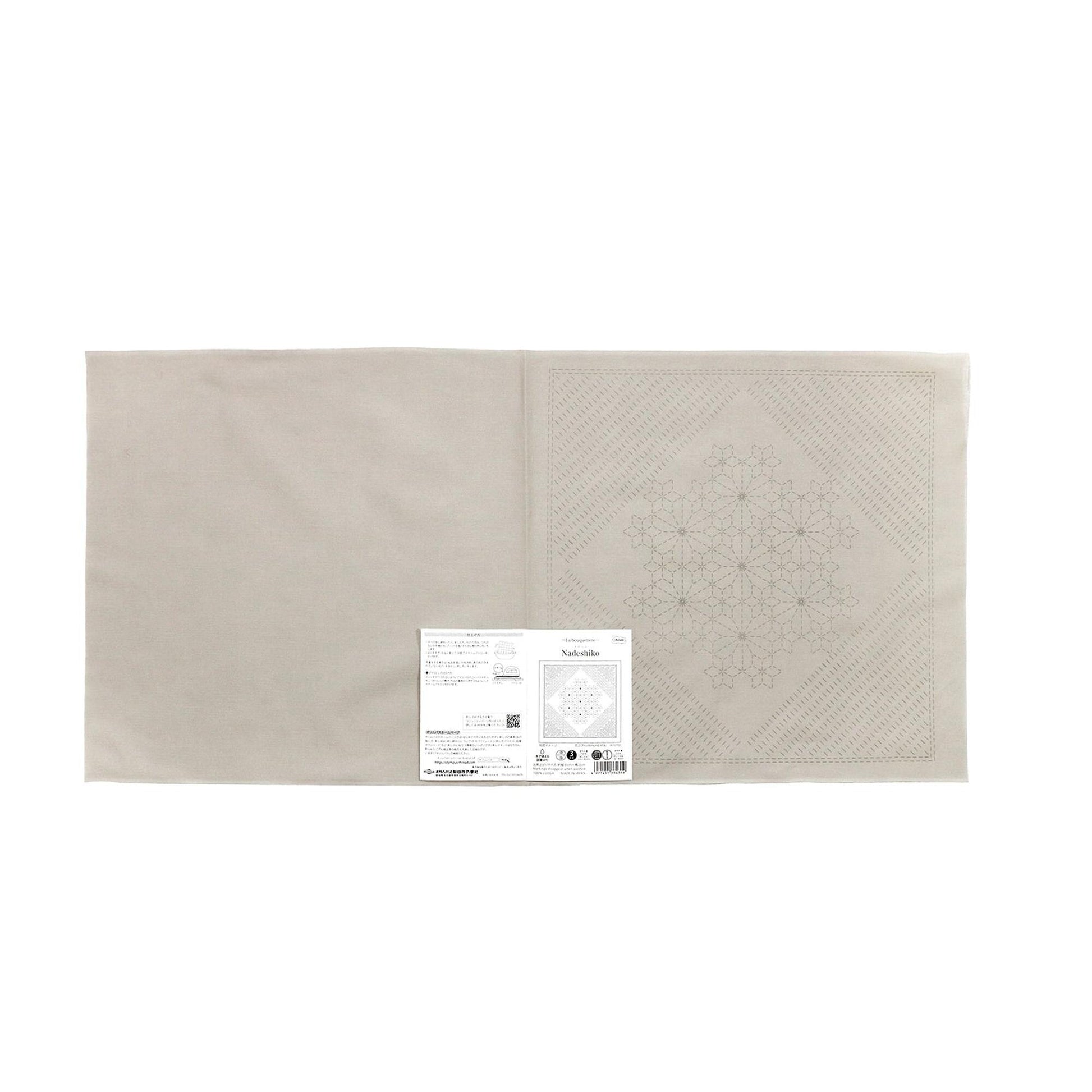 The image is a plain white fabric with a printed pattern on it.