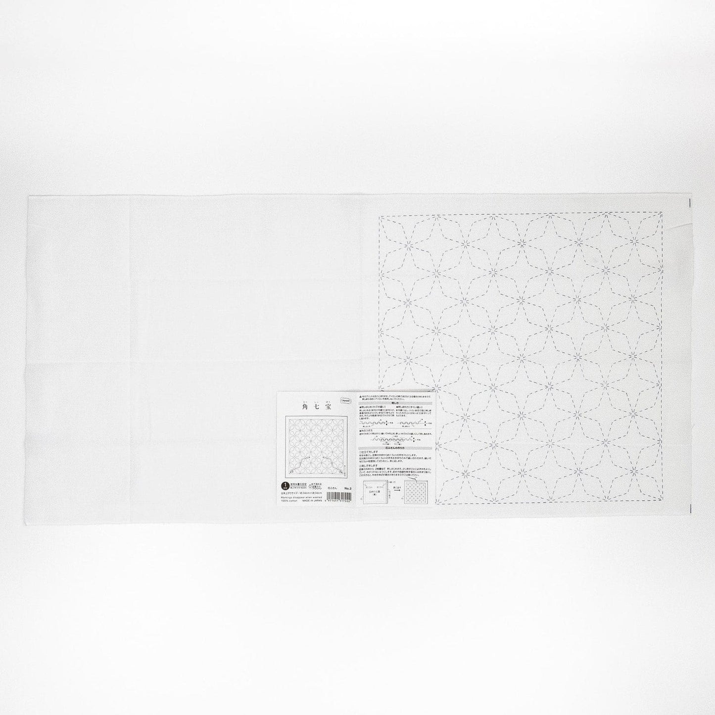 The image is a white sheet of paper with a black and white pattern or design on it.