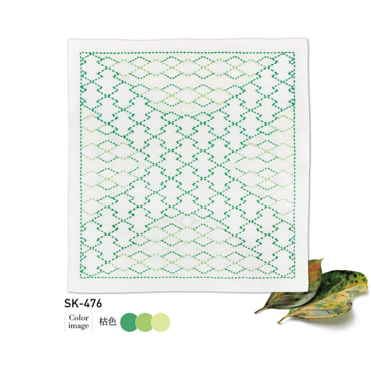 The image is a square with a green and white geometric pattern, and there are two leaves next to it.