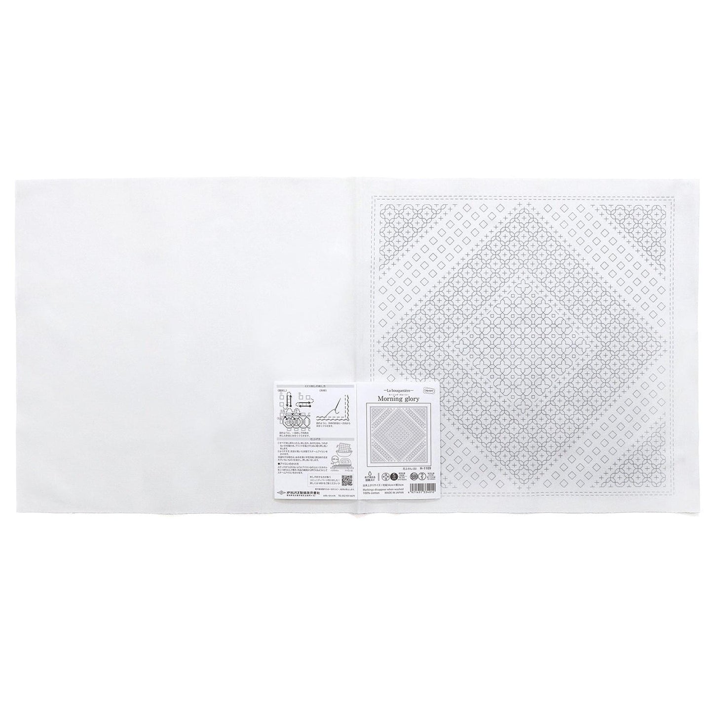 The image is a white square with a black and white pattern on it.