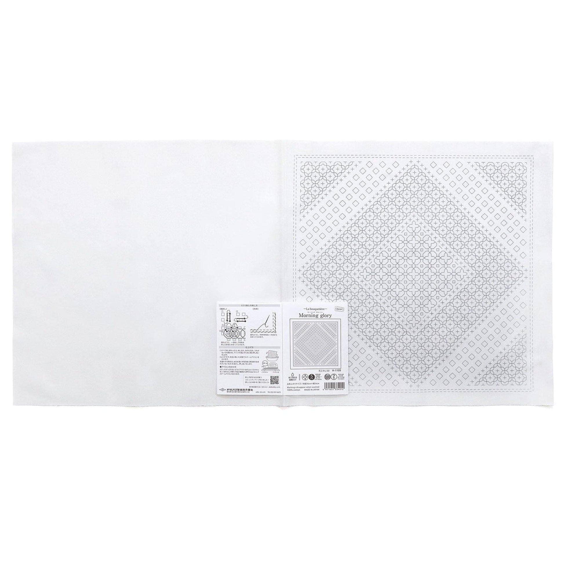 The image is a white square with a black and white pattern on it.
