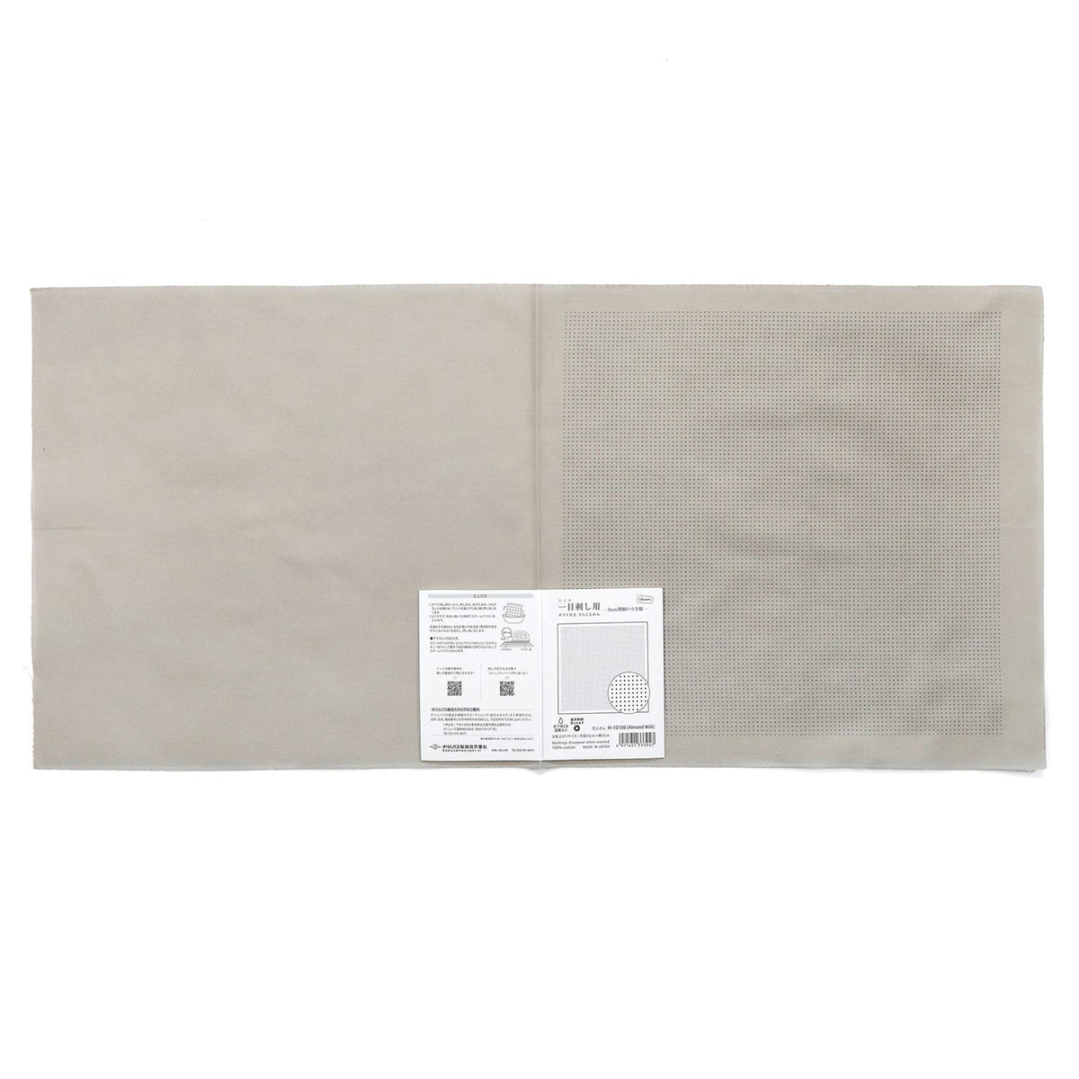 The image is a plain white fabric with a small white label attached to it, which appears to be a product label or instructions.
