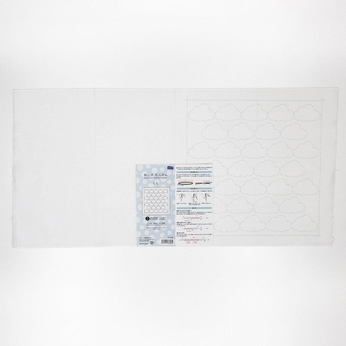 The image is a plain white background with a printed instruction sheet and a pattern on the right side.