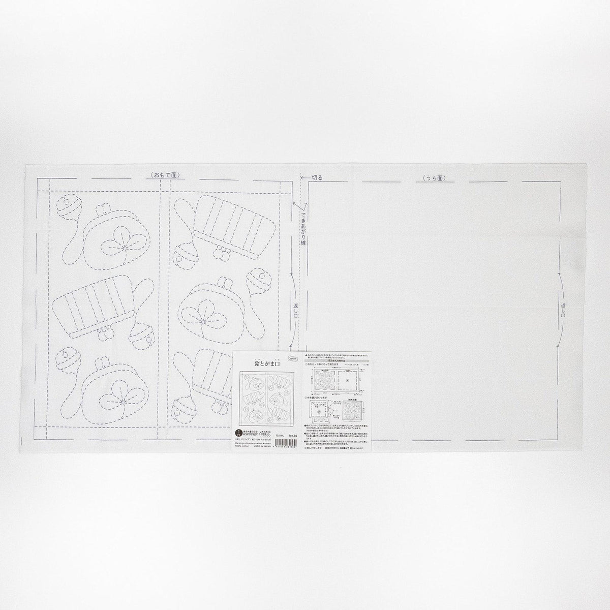 The image is a printed page with a design featuring various shapes and patterns, including a large square and smaller images of the same design.