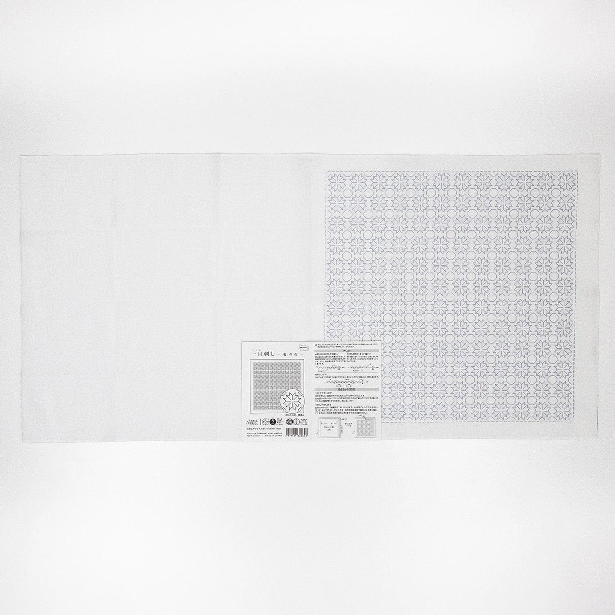 The image is a white sheet of paper with a patterned design on it.