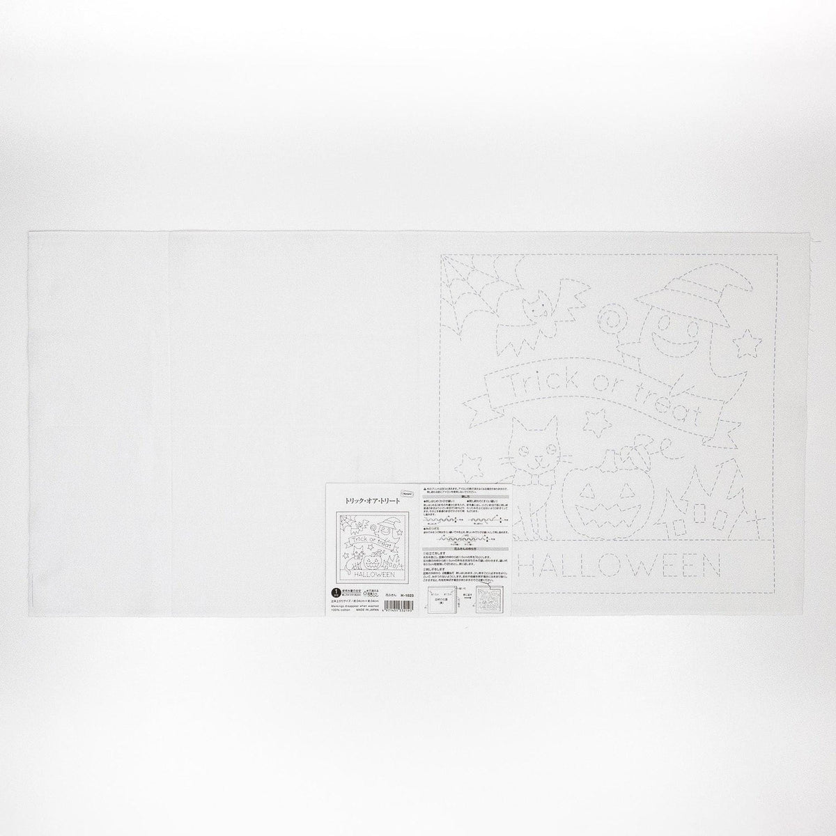 The image is a white sheet of paper with a Halloween-themed drawing and text.