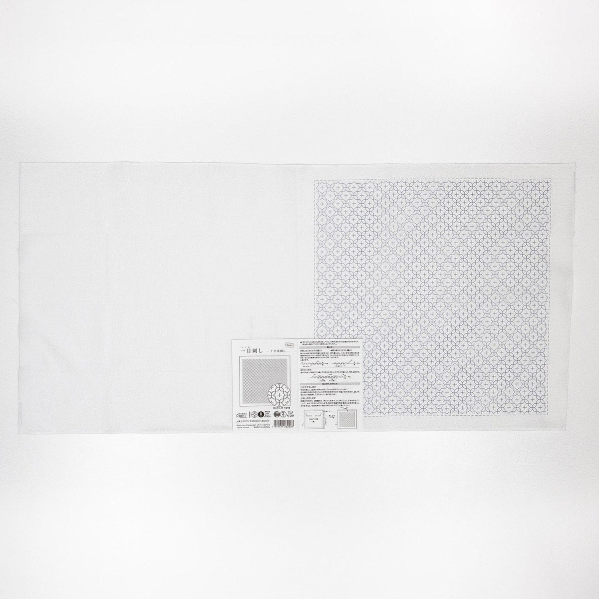 The image is a plain white sheet of paper with a small square pattern on it.