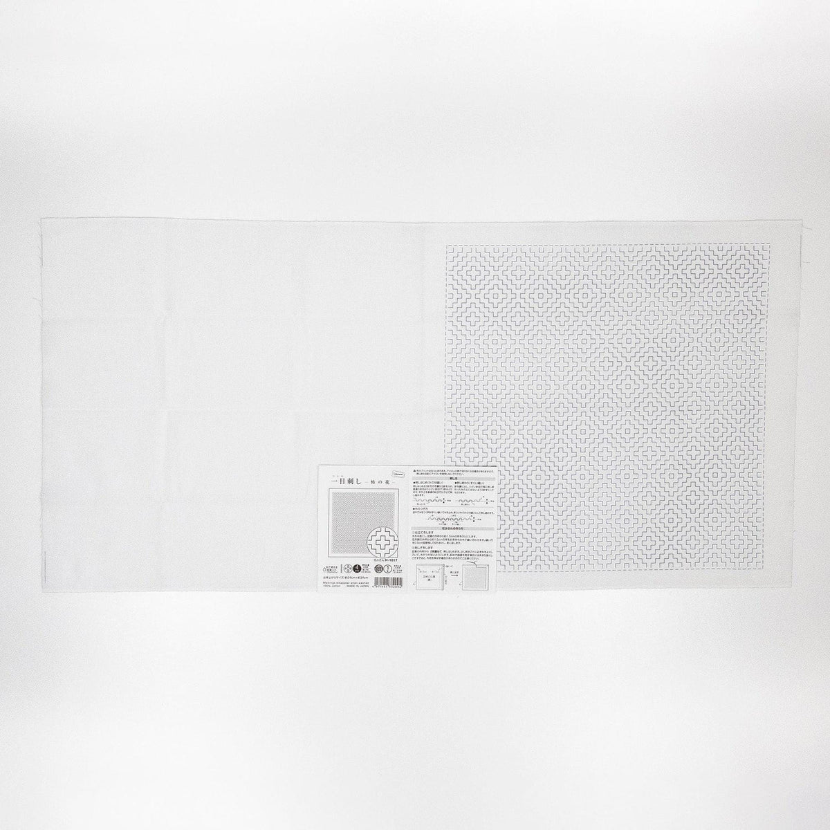The image is a plain white background with a small square pattern on the right side. There is also a small square label with text on the left side, but the text is not clear enough to transcribe accurately.
