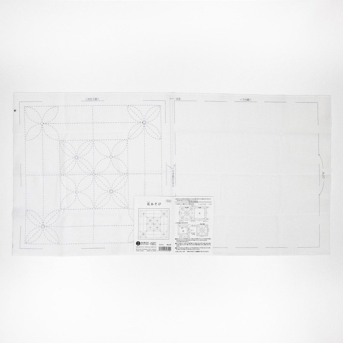 The image is a printed diagram or plan with various geometric shapes and patterns, including a large square and smaller square sections. The diagram appears to be a technical or technical drawing, possibly related to a sewing or crafting project.