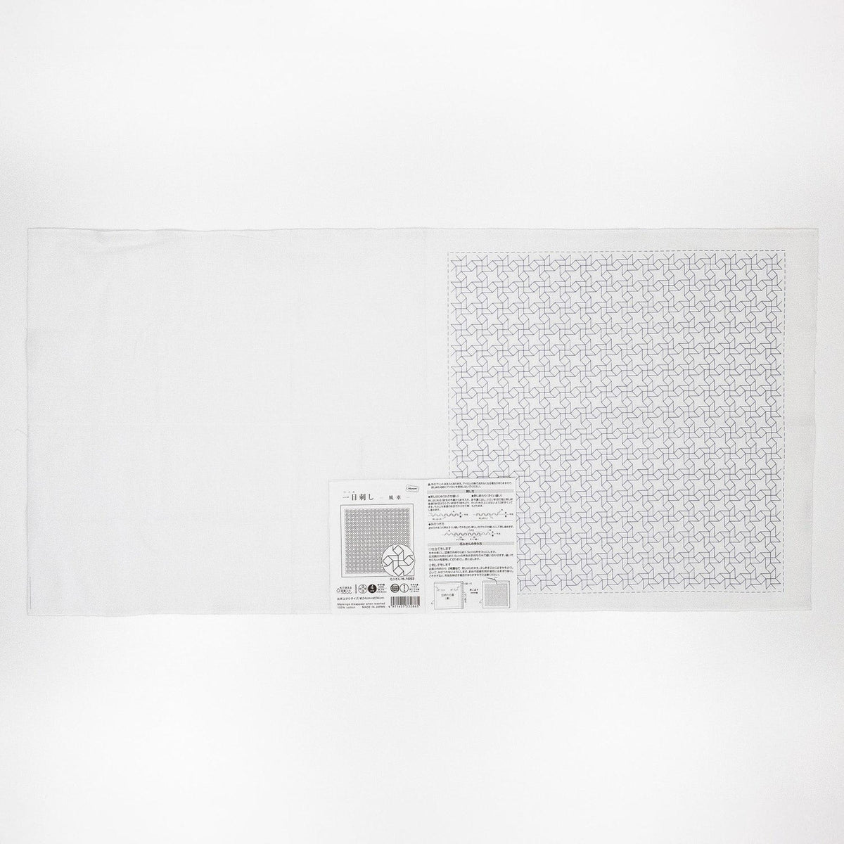 The image is a white sheet of paper with a pattern of small black dots on it.