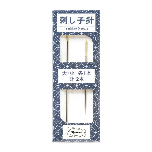 A pair of gold-colored sewing needles in a blue and white patterned box, with Japanese text and logos.