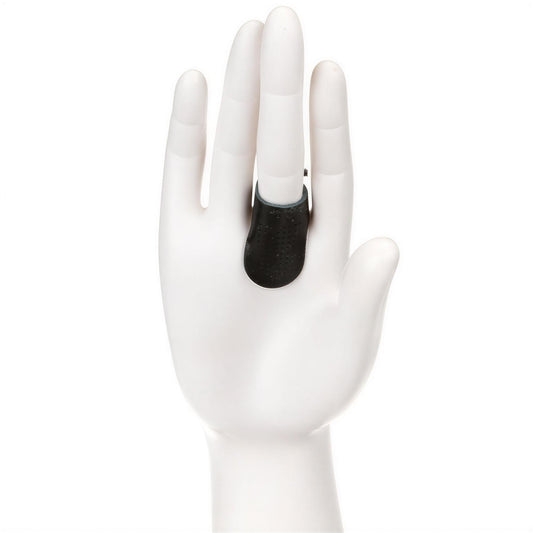 A white mannequin hand wearing a black ring on the ring finger.