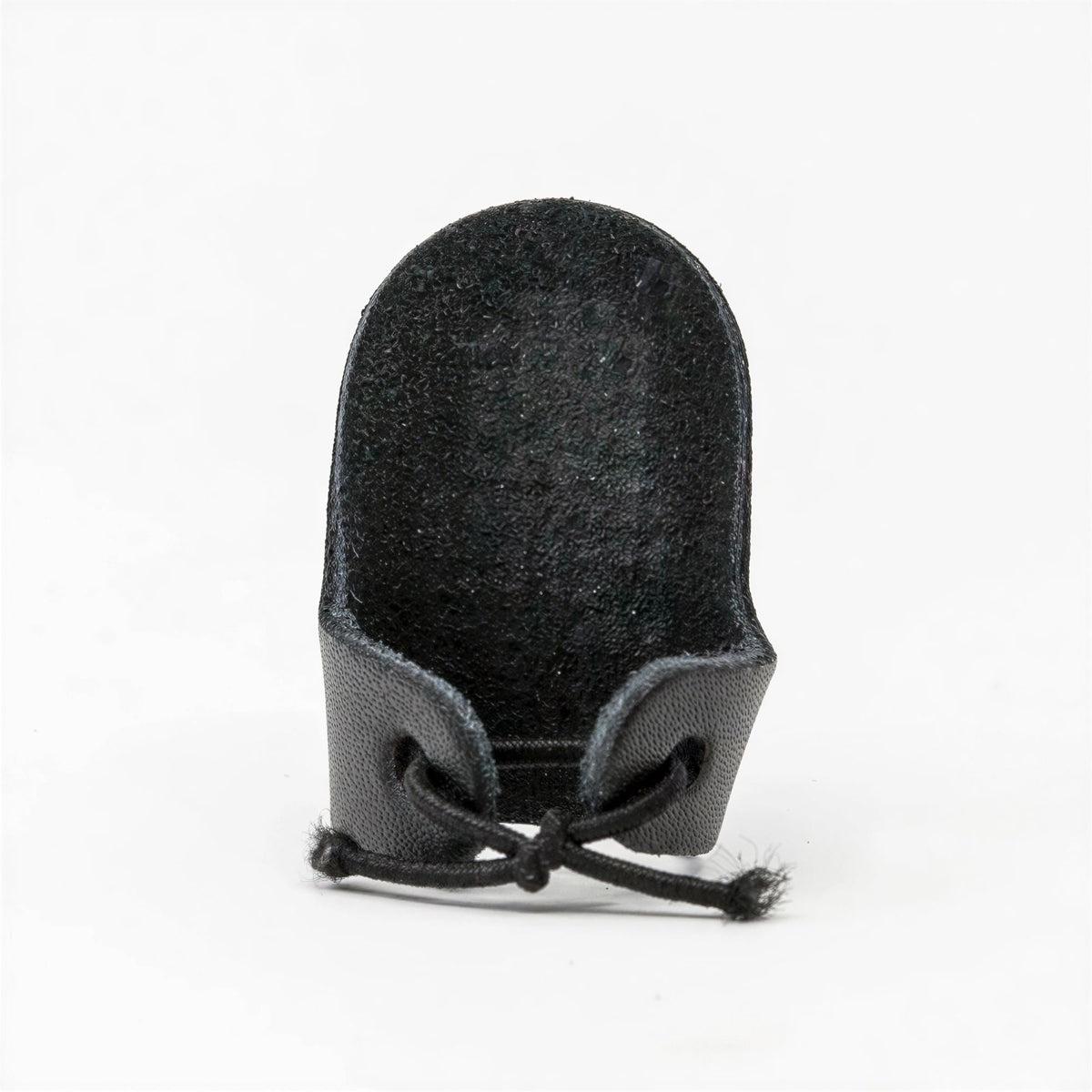 A black leather object with a curved shape and a black cord attached to it.