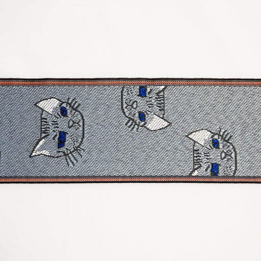 a repeating pattern of gray cat faces with blue eyes on a gray background.