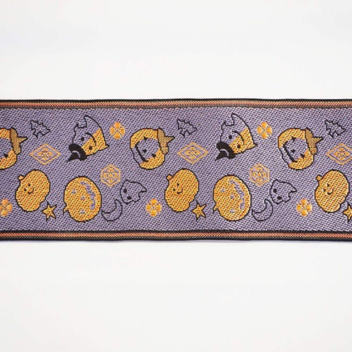 a repeating pattern of Halloween-themed pumpkins and bats on a purple background.