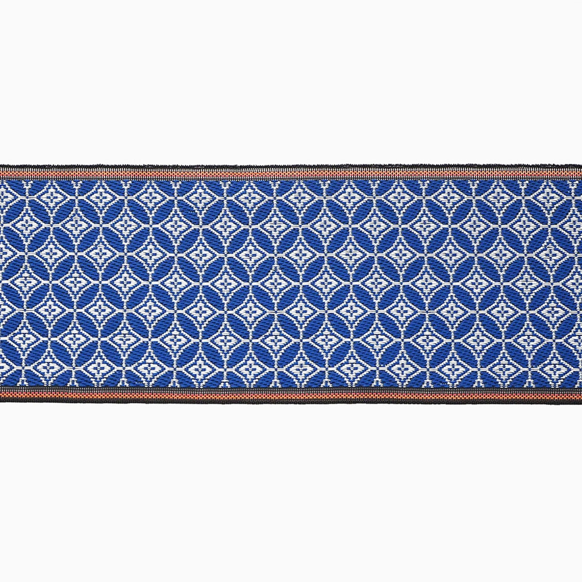 a repeating pattern of blue and white geometric shapes, creating a visually striking and intricate design.