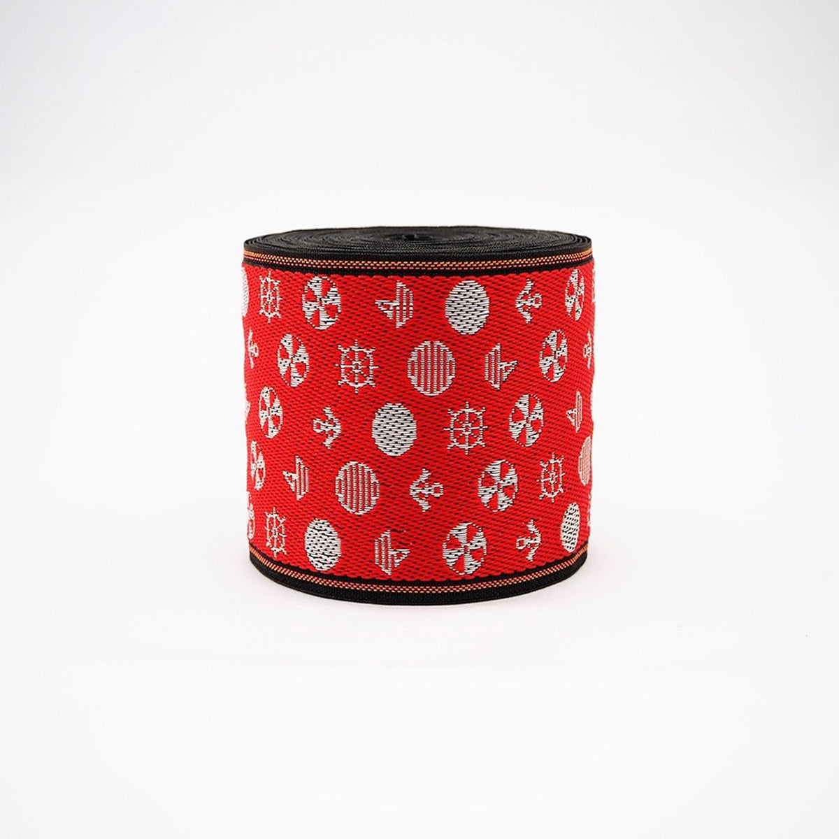a red and black object with a repeating pattern of white and silver circles and lines on a white background.