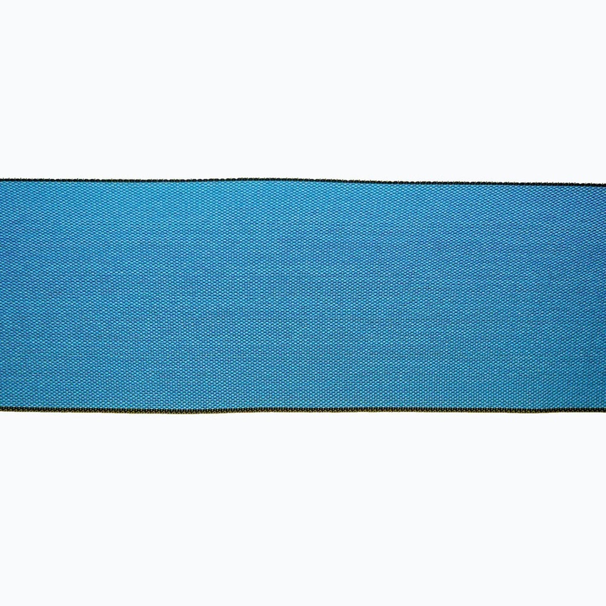 A close-up view of a blue fabric with a diagonal pattern, creating a sense of movement and texture.