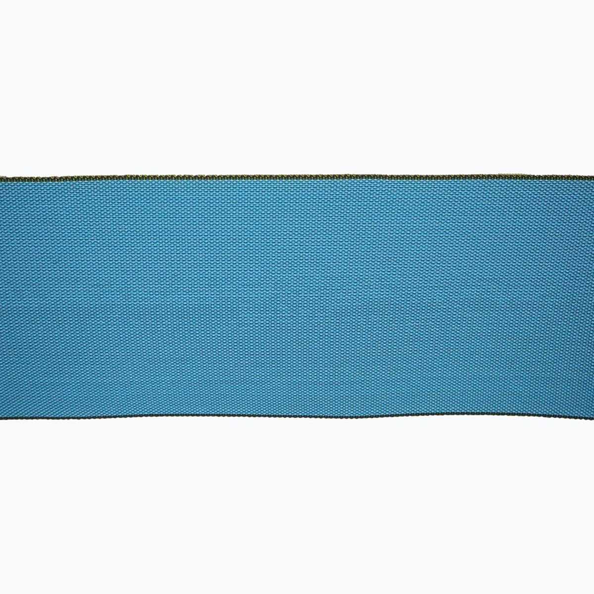 A close-up view of a blue fabric with a textured pattern, set against a white background.