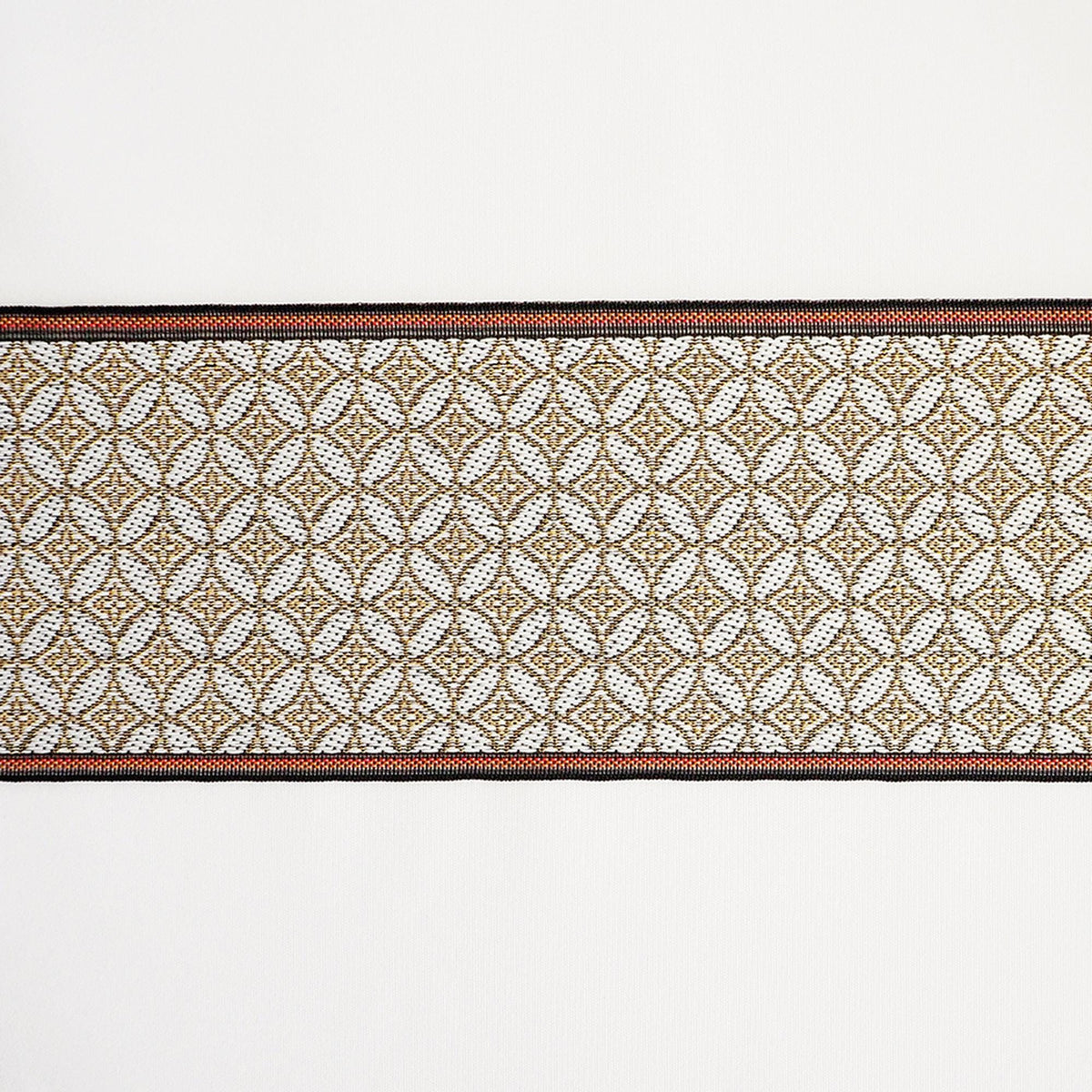a decorative border with a repeating pattern of white and gold geometric shapes.