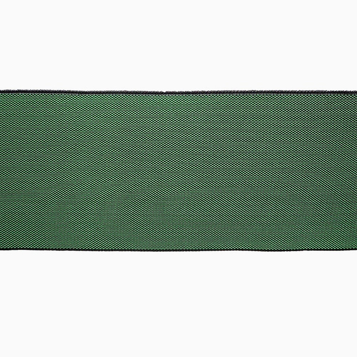 The image is a close-up of a green fabric with a black border, which appears to be a piece of clothing or textile.