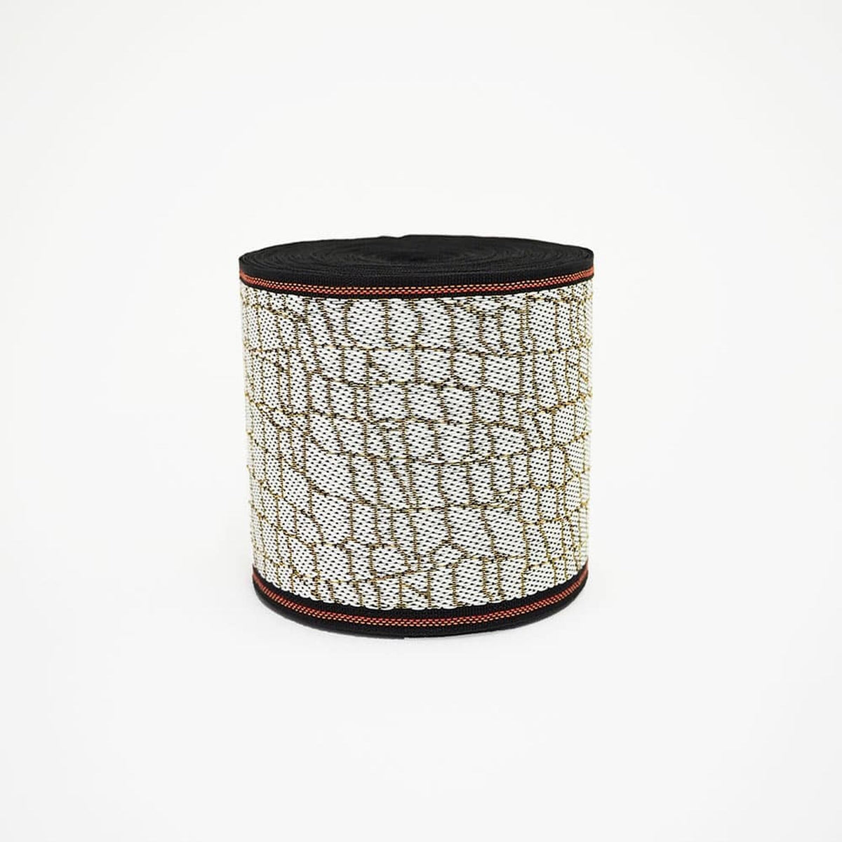 A cylindrical container with a black and white patterned design, featuring a black top and a red border around the edge.