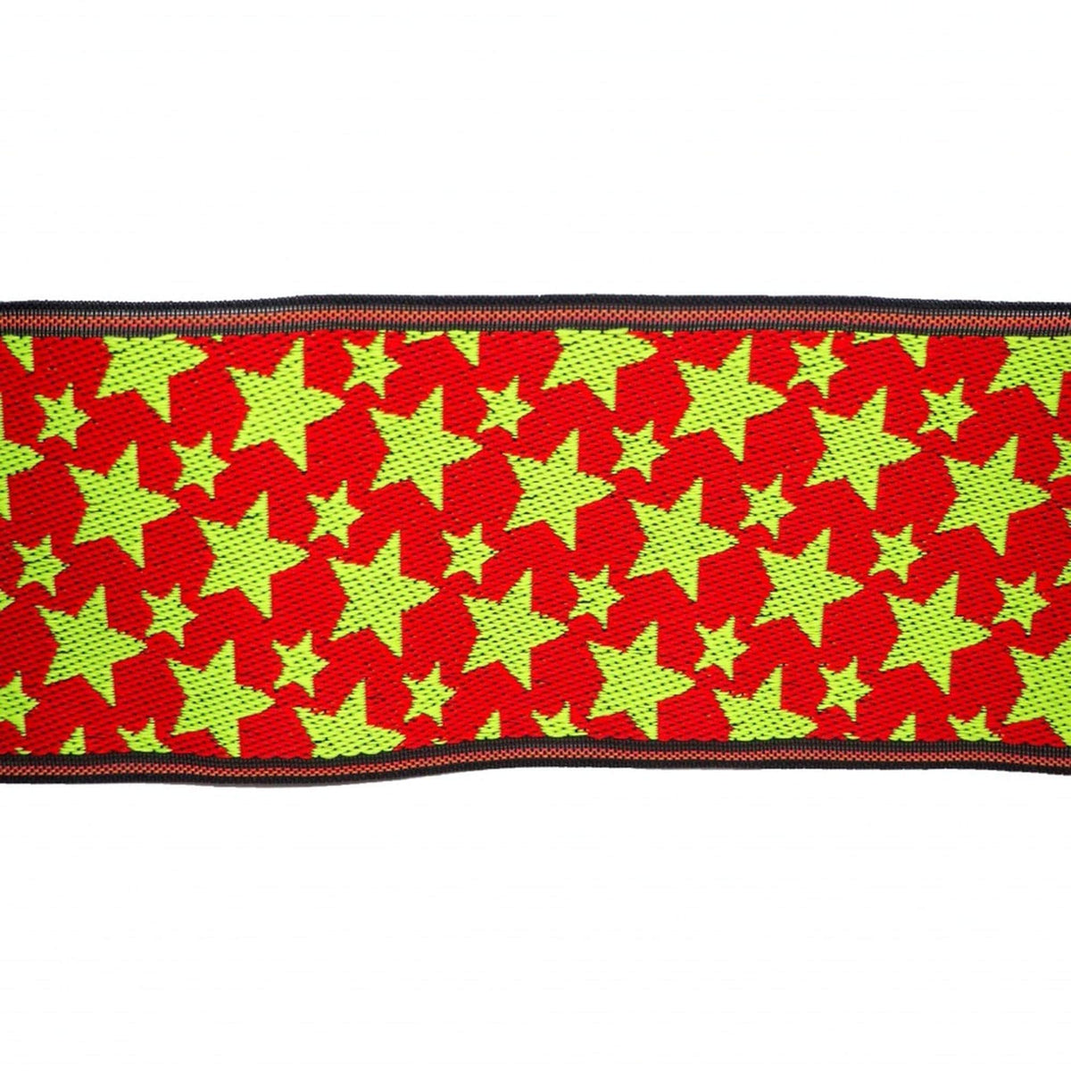 a vibrant red and green pattern of yellow stars on a red background.