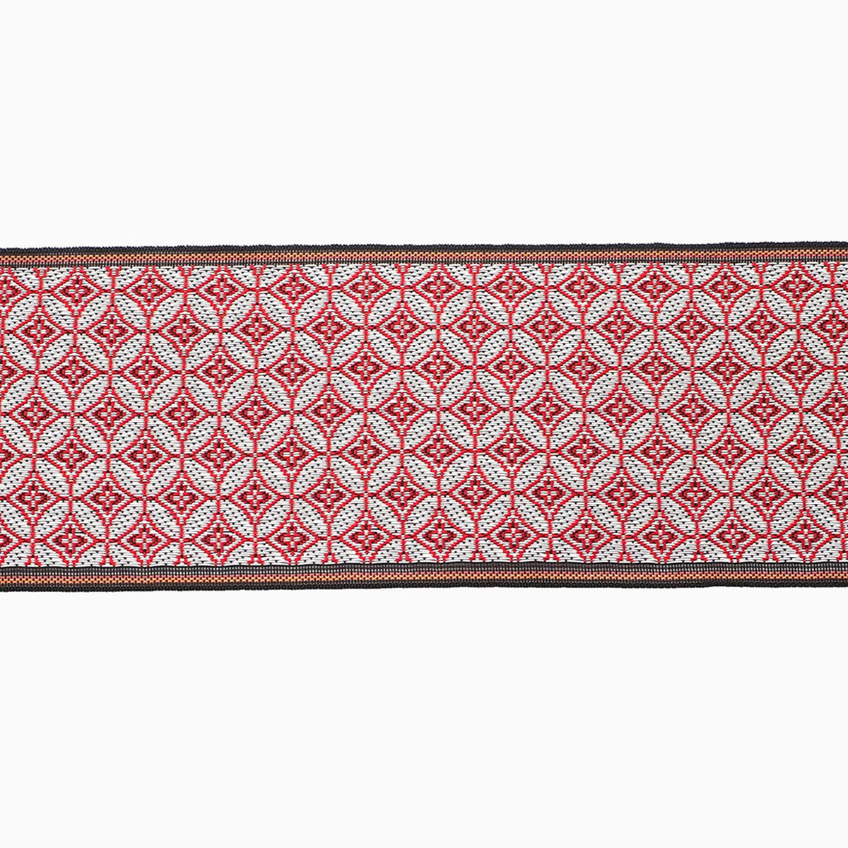 a repeating pattern of red and white diamond shapes on a black border.