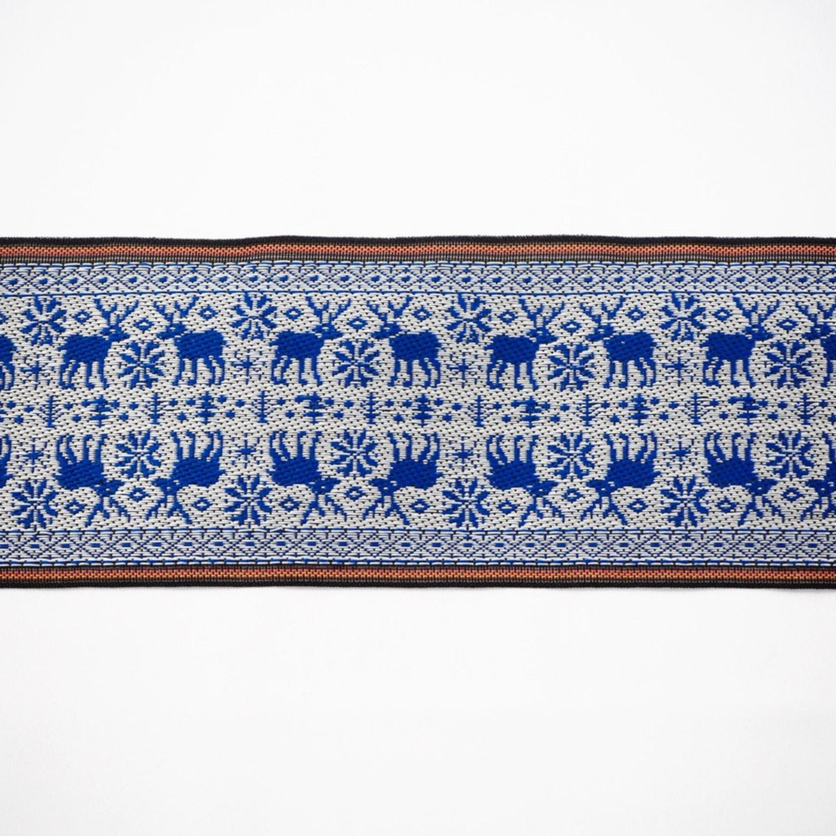 a decorative border with a repeating pattern of blue and white animals, such as deer, and snowflakes.