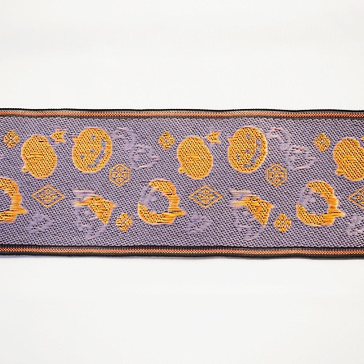 a decorative border with a repeating pattern of orange and purple circles and stars on a purple background.