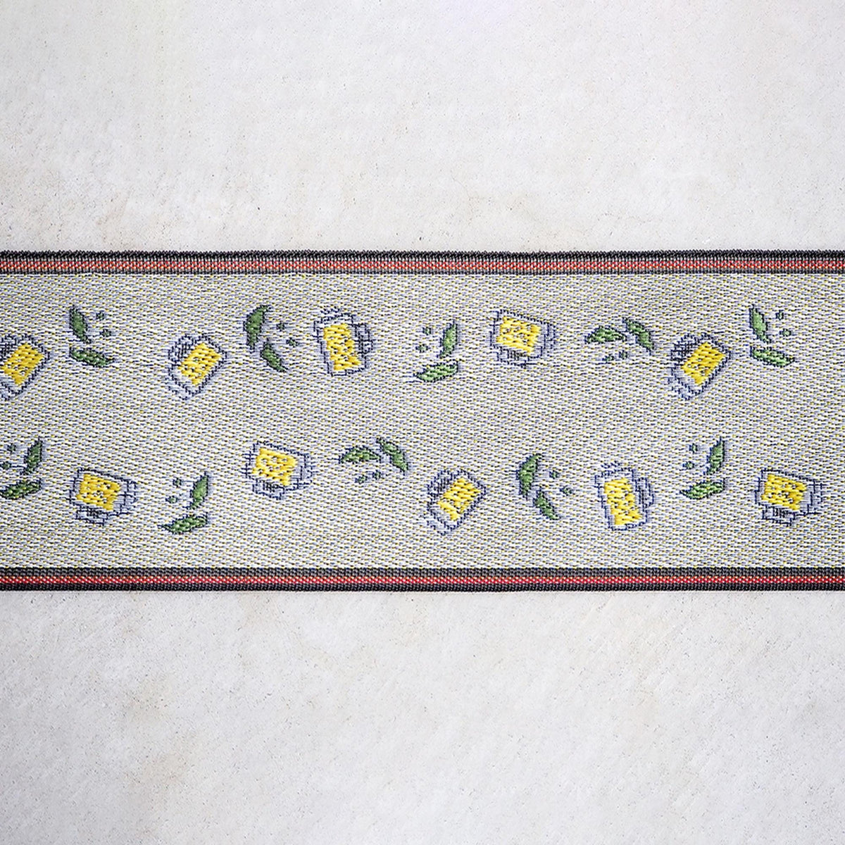 a decorative border with a repeating pattern of beer mugs and leaves on a white background.