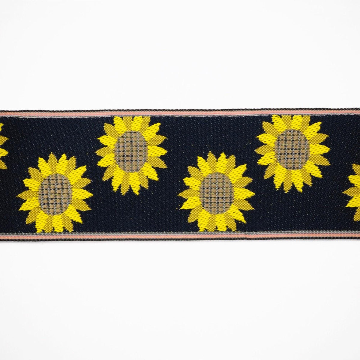 a repeating pattern of yellow sunflowers on a black background.