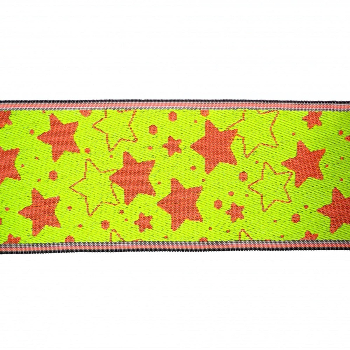 a vibrant pattern of red and orange stars on a bright green background.
