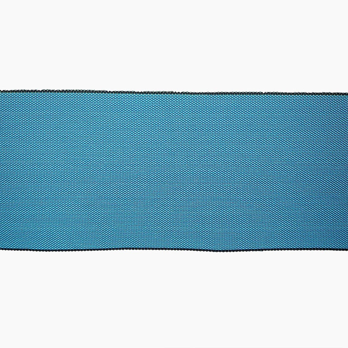 A close-up view of a blue fabric with a textured pattern, featuring a black border.