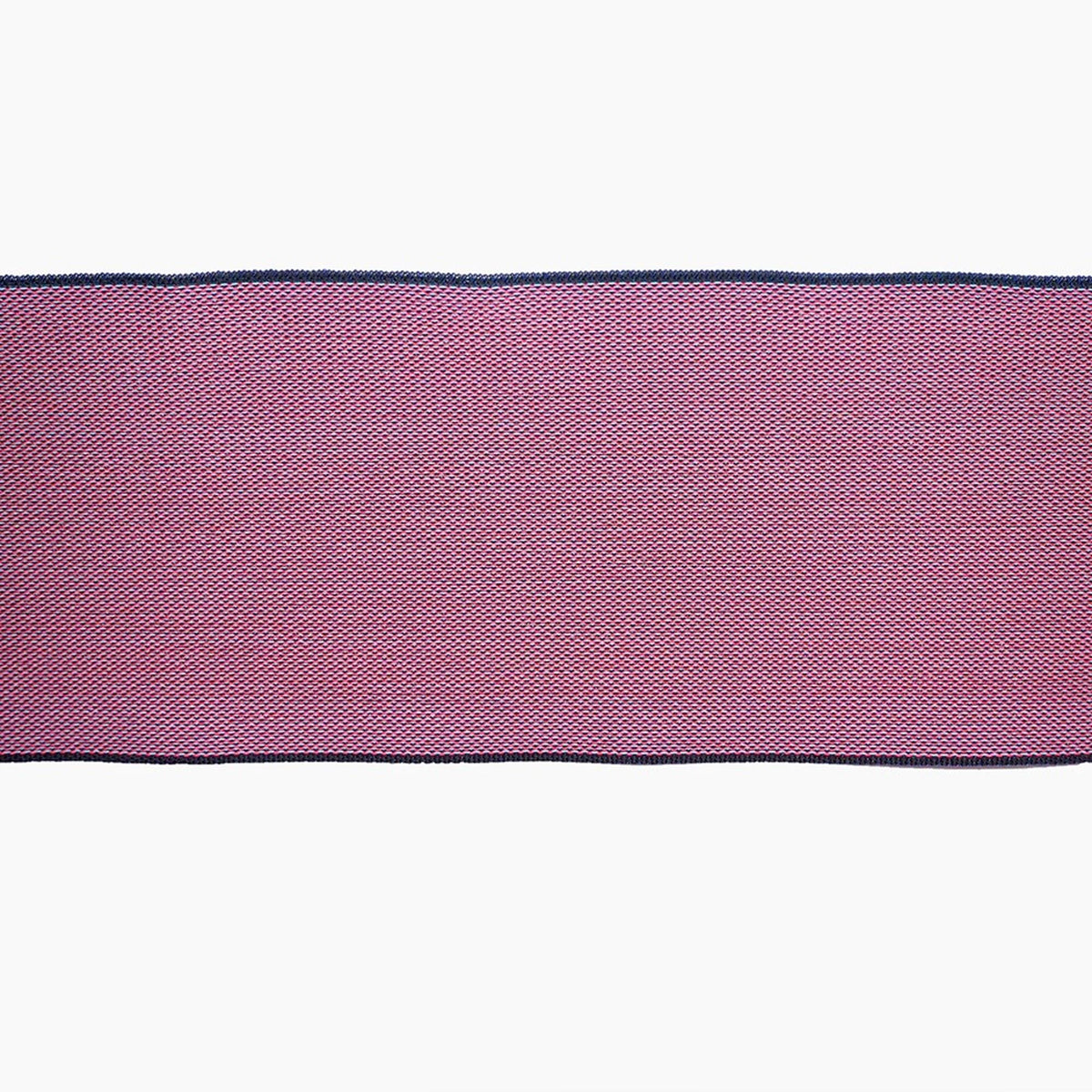 a close-up view of a red and black checkered pattern on a white background.