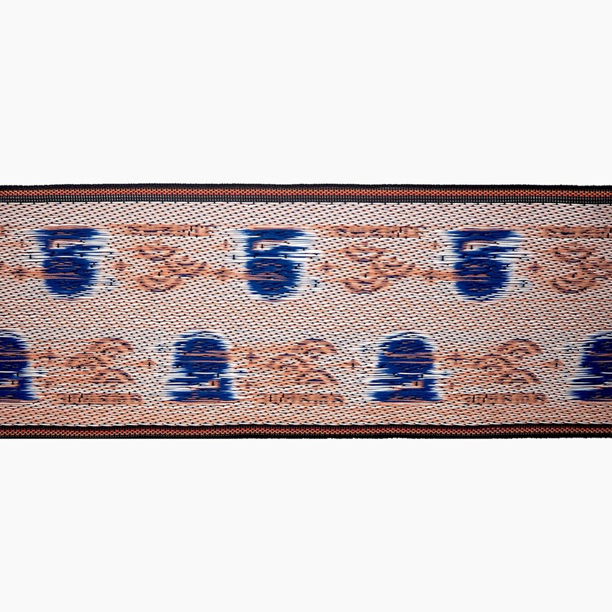 a close-up view of a textured fabric with a repeating pattern of blue and orange shapes.
