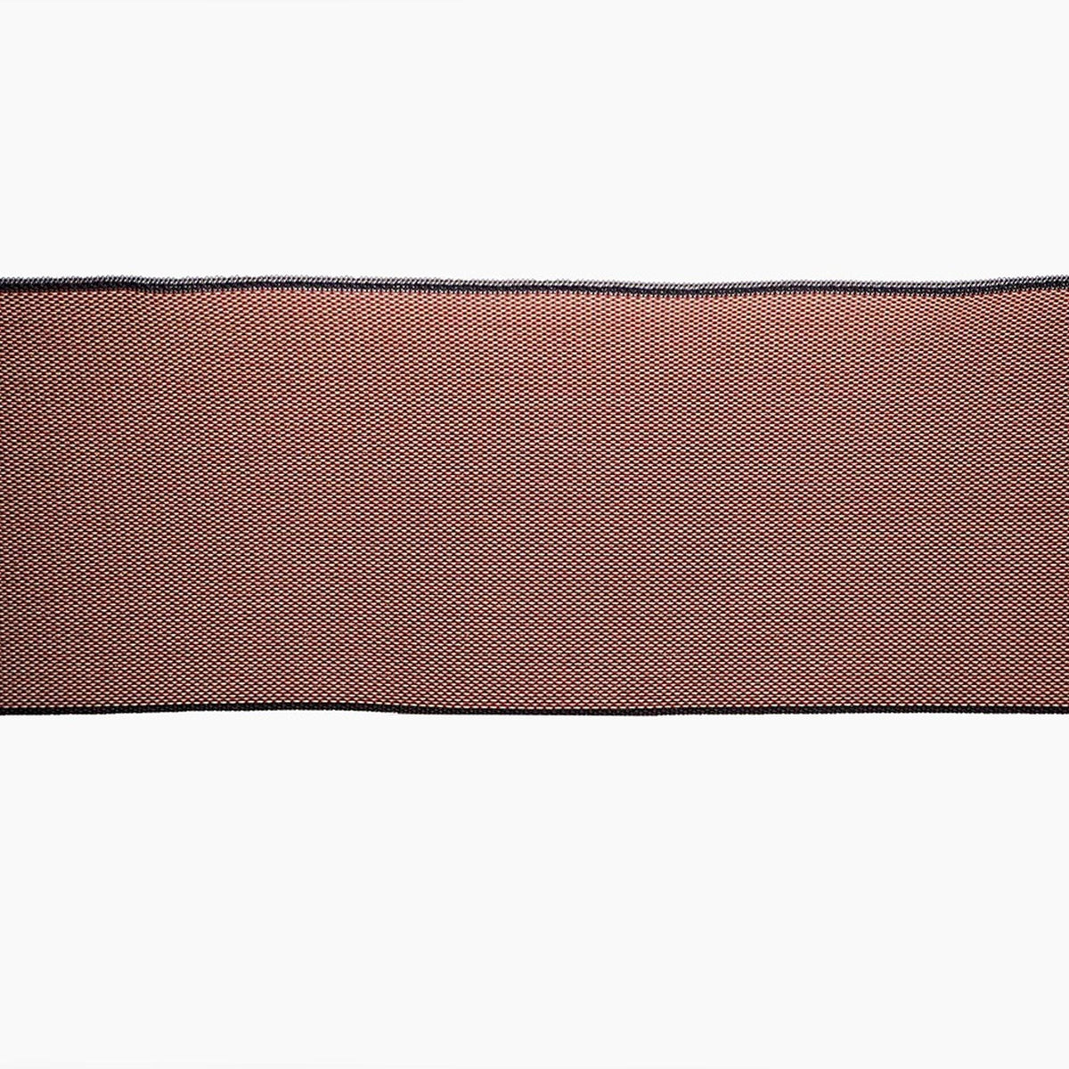 a close-up view of a red and black striped fabric or material, with a white background.