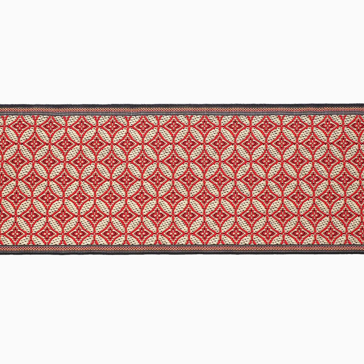 a red and white patterned fabric with a repeating diamond-shaped design.