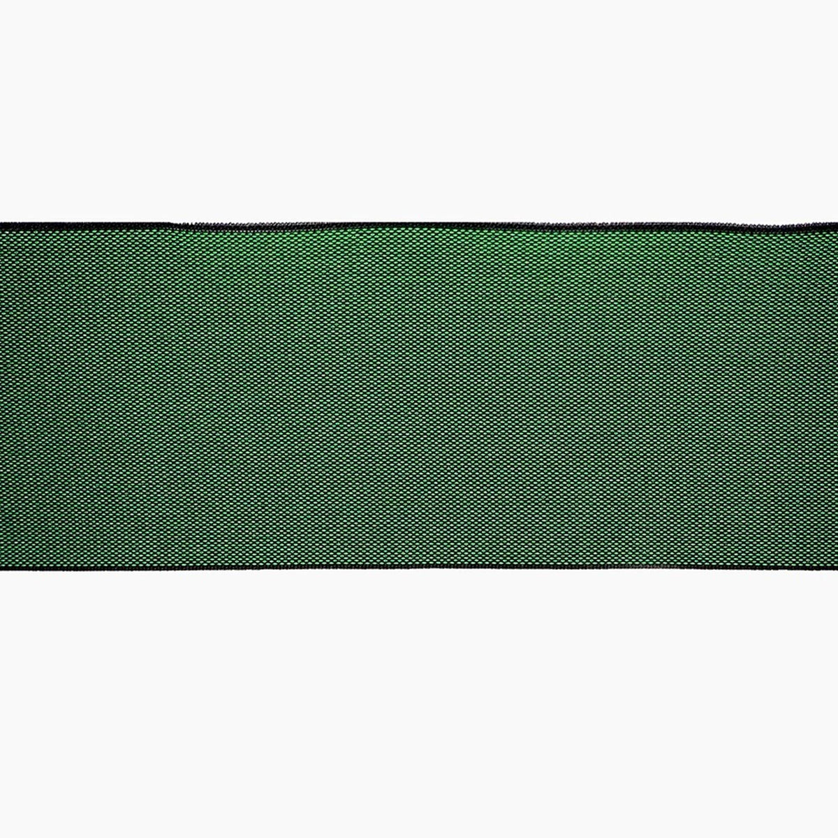 A close-up view of a green fabric with a diagonal pattern, creating a textured appearance.