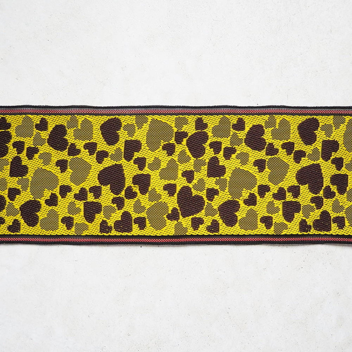 a pattern of yellow hearts on a white background.