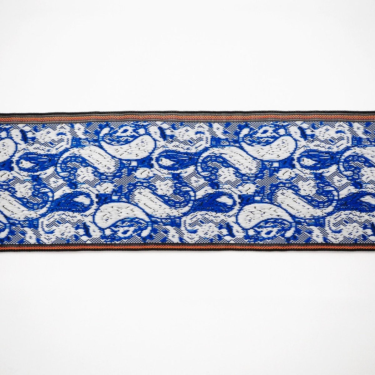 a repeating pattern of blue and white fish or sea creatures on a white background.