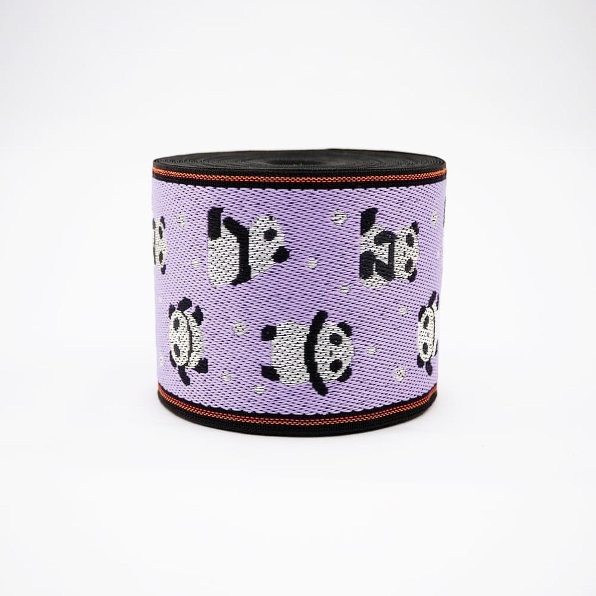 A purple and black woven object with a repeating pattern of panda silhouettes.