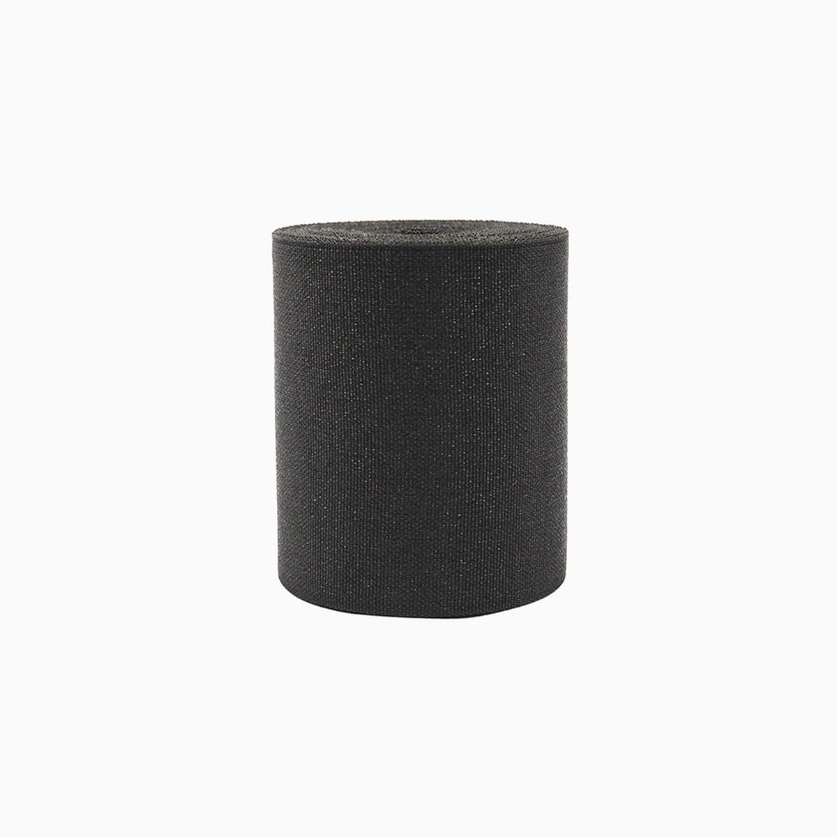 A black cylindrical object with a textured surface, standing alone against a white background.