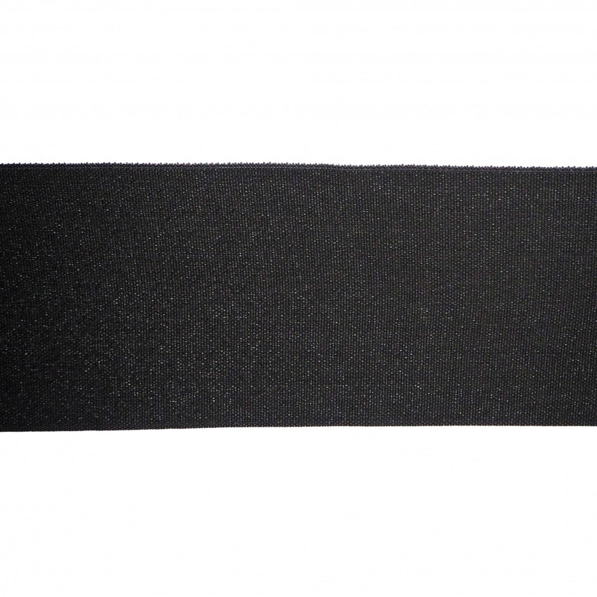 A close-up view of a black fabric or material, such as a ribbon or belt, against a white background.